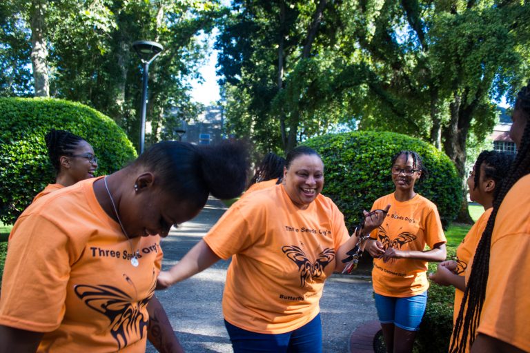 Butterfly connection volunteers laughing and having fun.